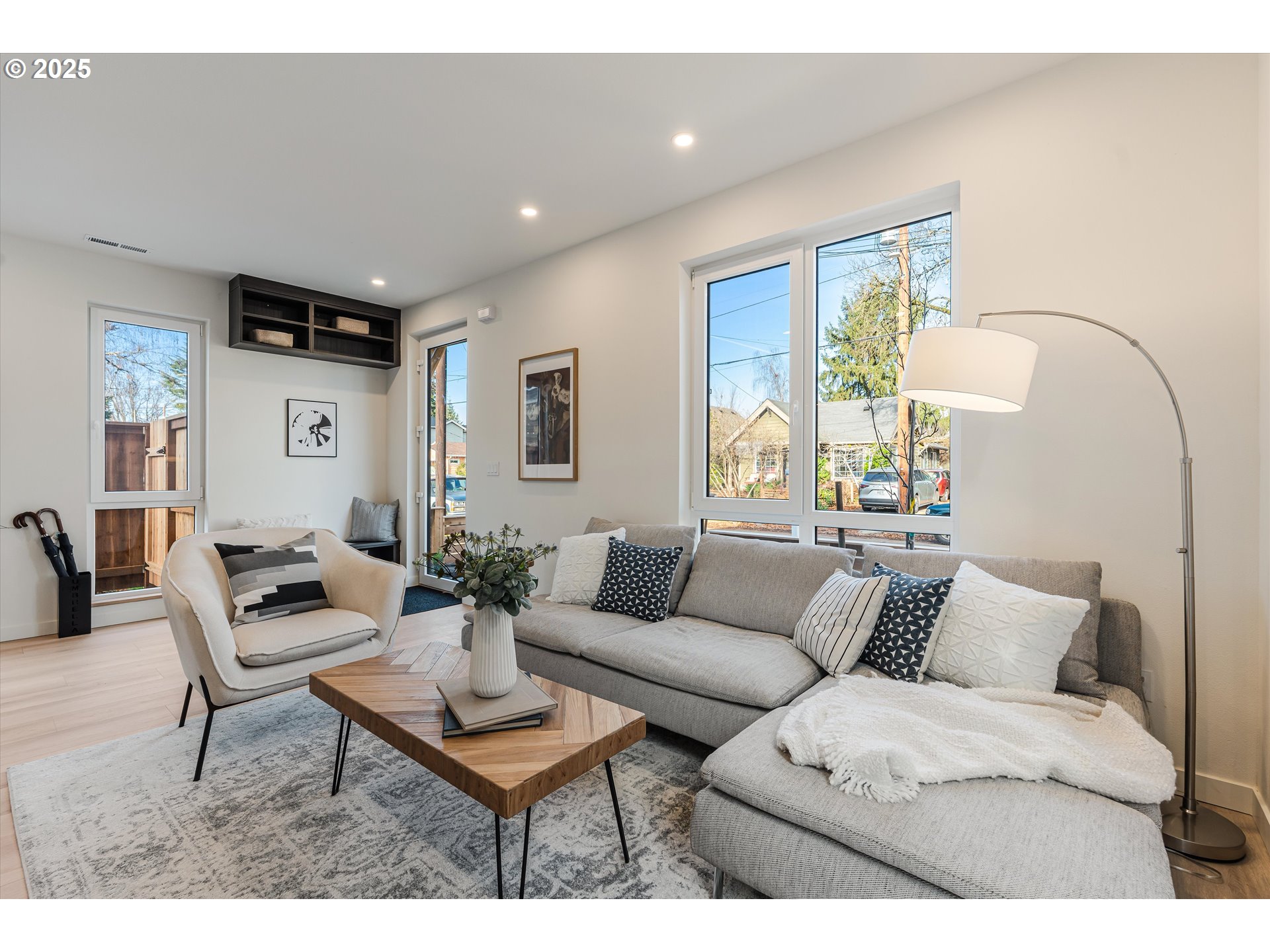 5490 Southeast Boise Street Portland, OR 97206 - Photo 4 of 48 a living room with furniture and wooden floor