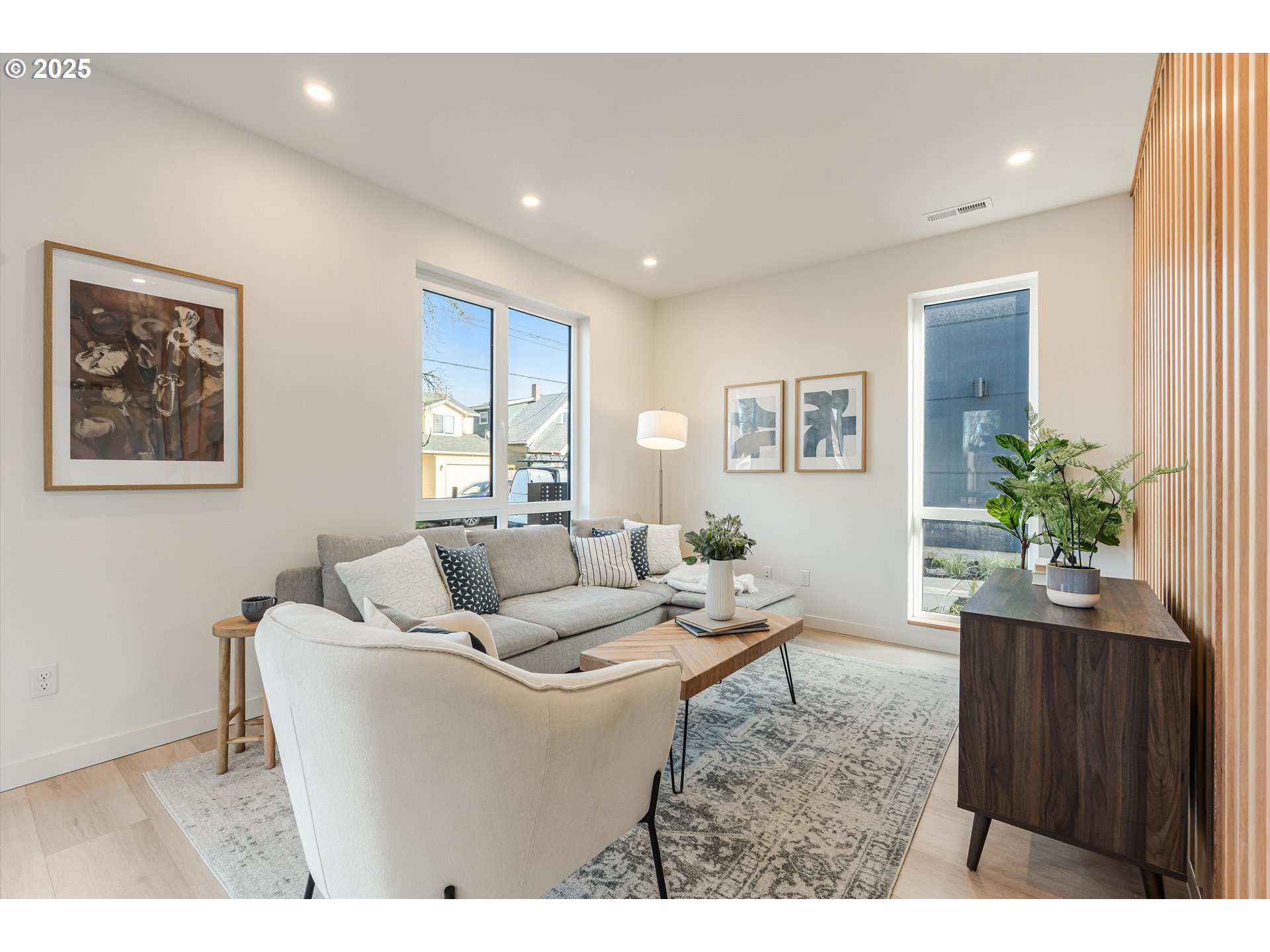 5490 Southeast Boise Street Portland, OR 97206 - Photo 7 of 48 a living room with furniture and flowers