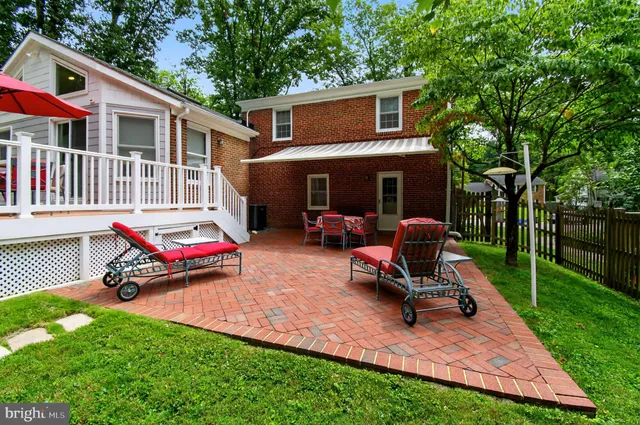 a view of a backyard with a patio