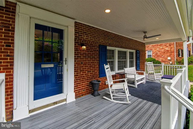 an outdoor view of a house with wooden floor and outdoor space