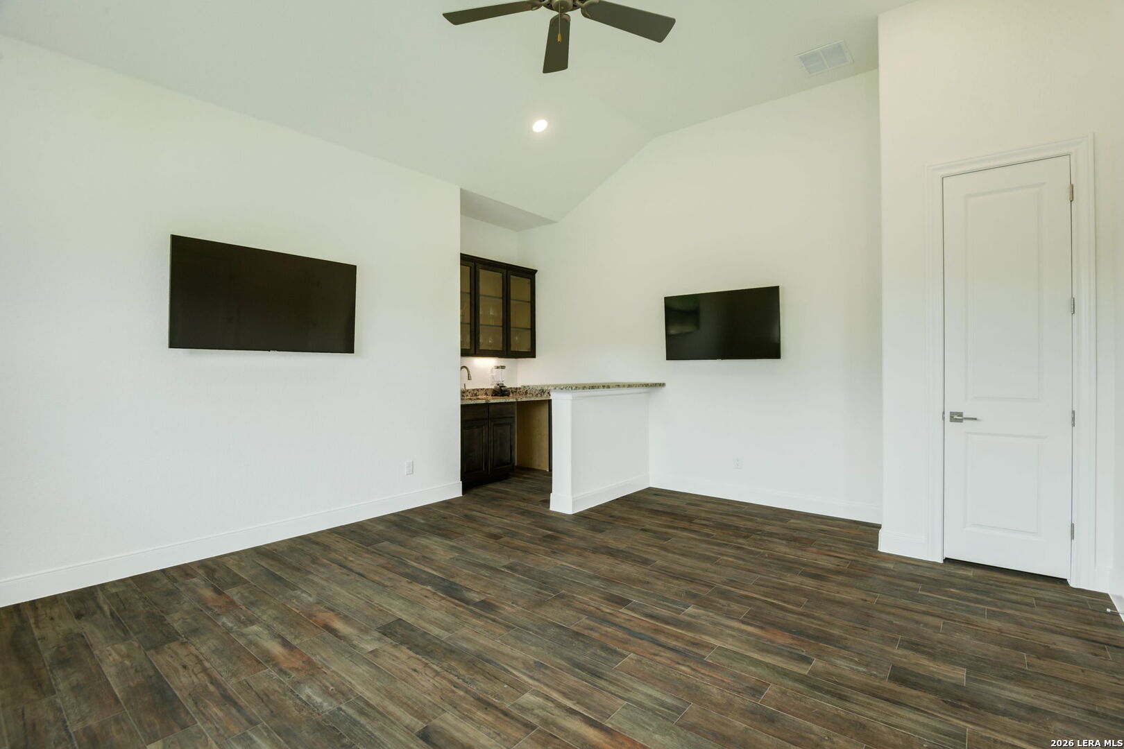 1465 Ironwood Road Fischer, TX 78623 - Photo 19 of 38 a view of a livingroom with a flat screen tv