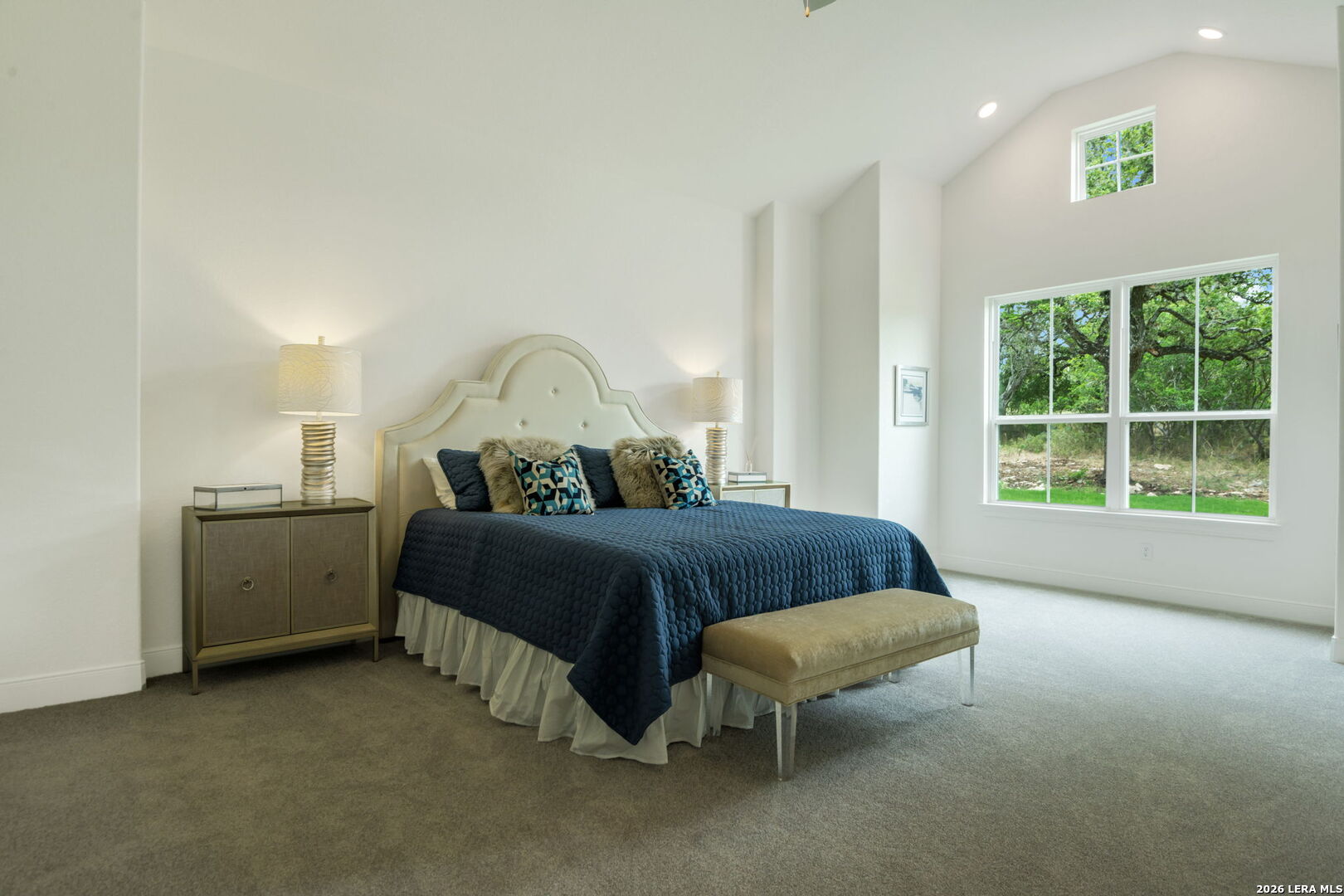 1465 Ironwood Road Fischer, TX 78623 - Photo 21 of 38 a spacious bedroom with a bed and a window
