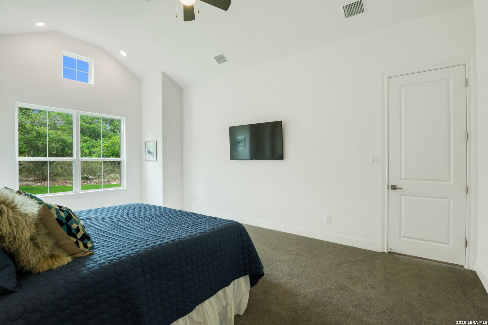 1465 Ironwood Road Fischer, TX 78623 - Photo 22 of 38 a bedroom with a bed and a window
