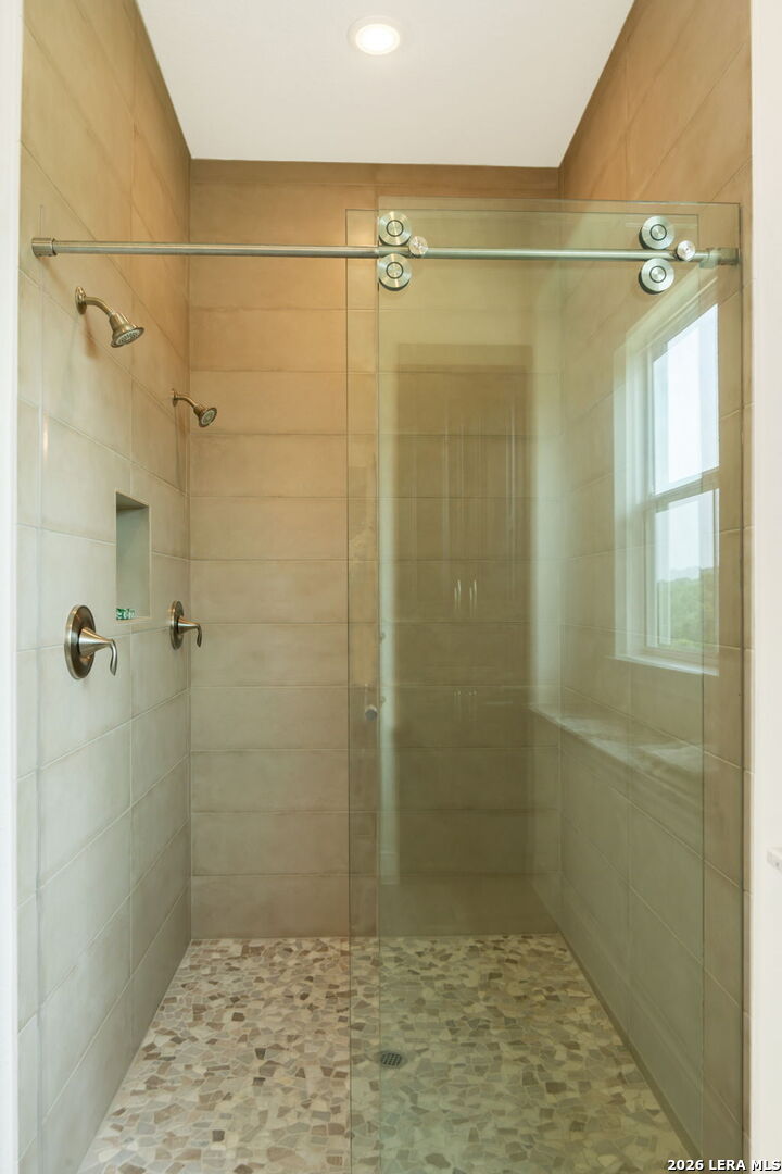 1465 Ironwood Road Fischer, TX 78623 - Photo 27 of 38 a bathroom with a shower