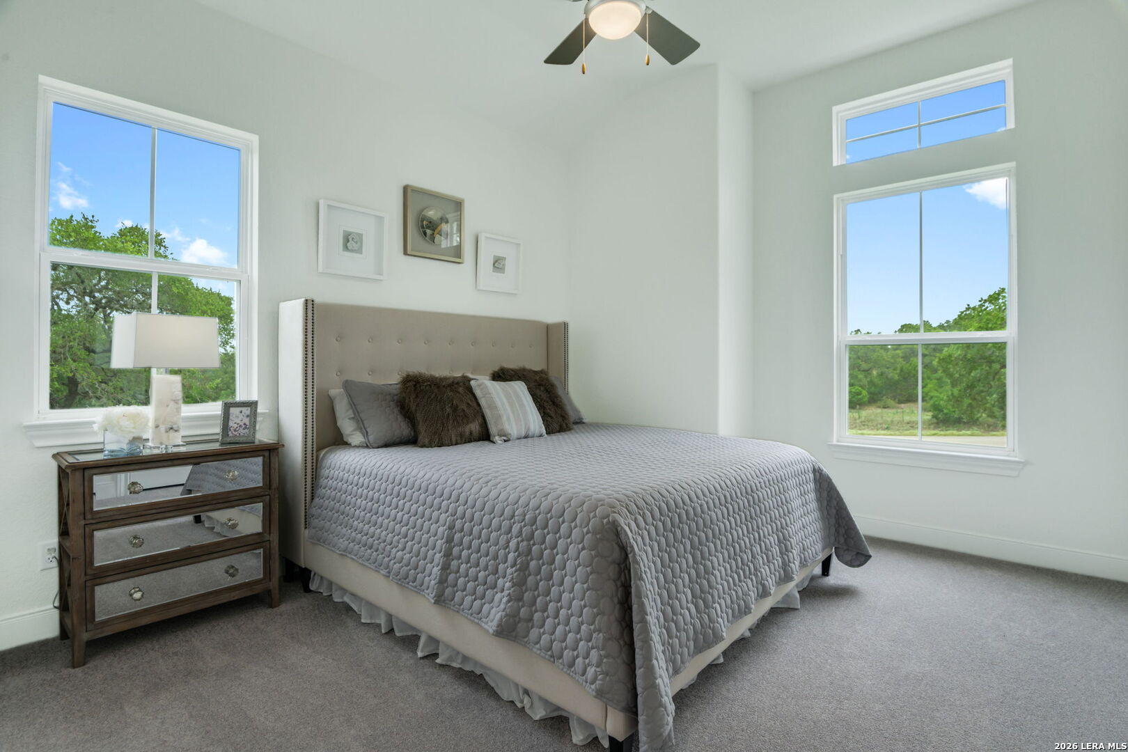 1465 Ironwood Road Fischer, TX 78623 - Photo 29 of 38 a bedroom with a bed and a window