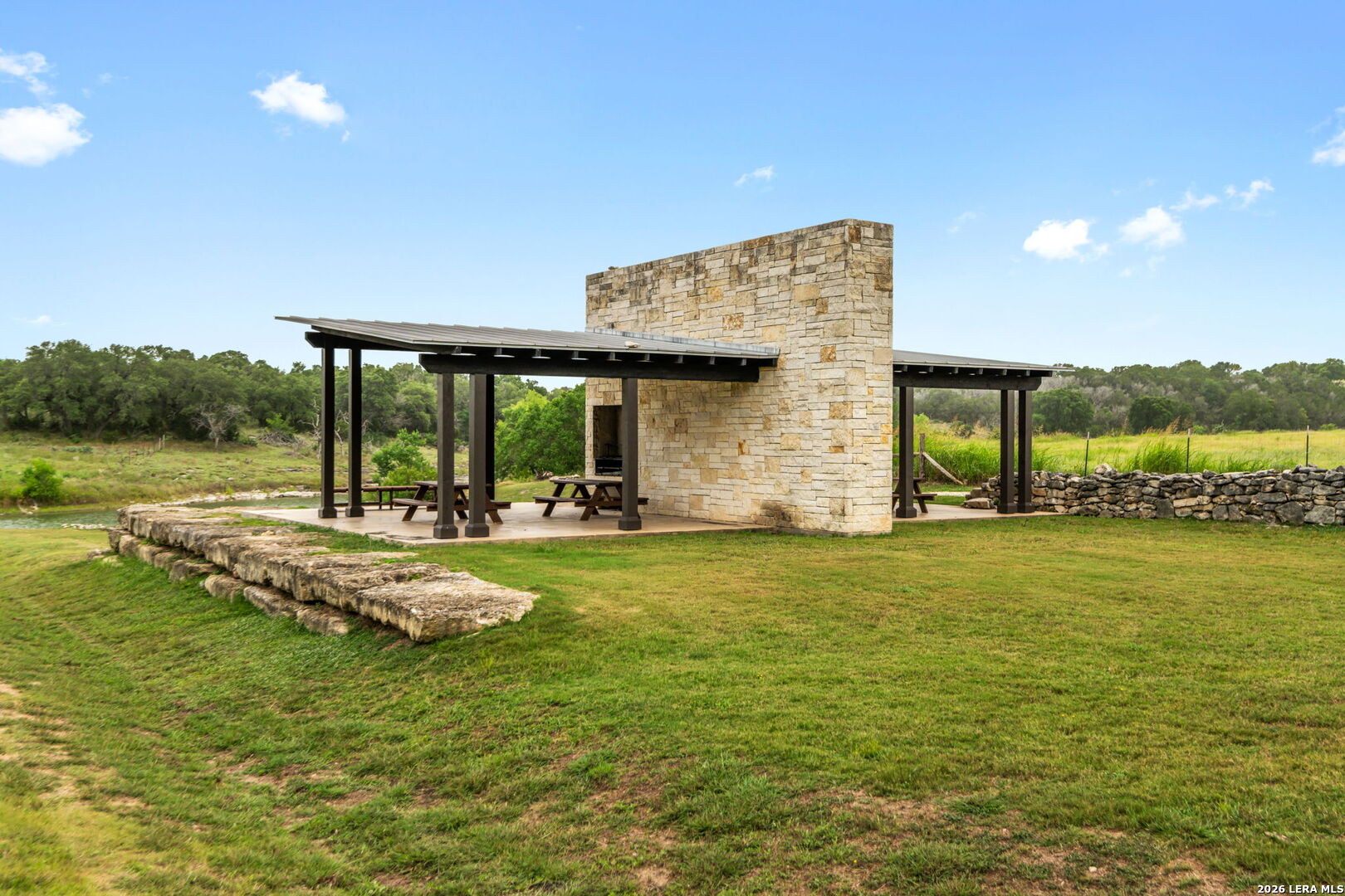 1465 Ironwood Road Fischer, TX 78623 - Photo 33 of 38 a view of a house with yard and lake view