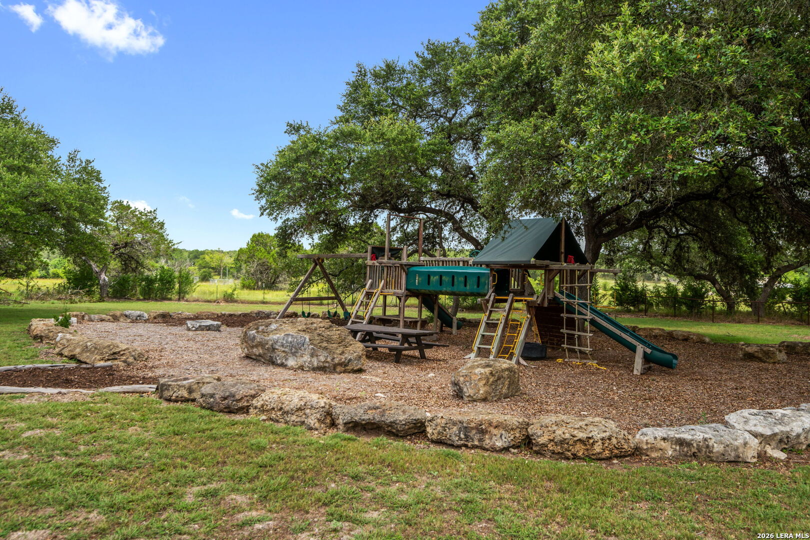 1465 Ironwood Road Fischer, TX 78623 - Photo 37 of 38 a view of a park with large trees