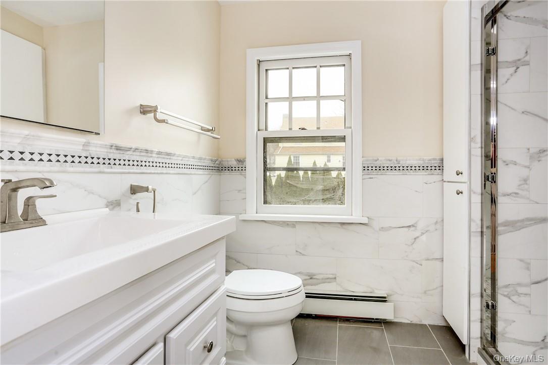 145 Johnson Road Scarsdale, NY 10583 - Photo 14 of 21 Updated hall bathroom