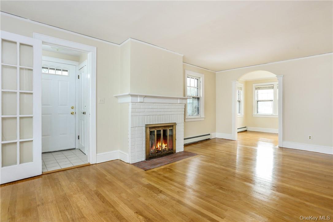 145 Johnson Road Scarsdale, NY 10583 - Photo 2 of 21 Living room with fireplace