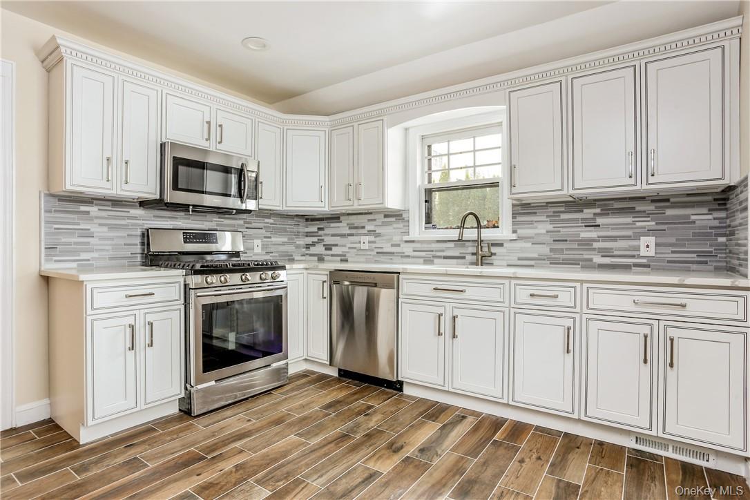 145 Johnson Road Scarsdale, NY 10583 - Photo 8 of 21 Updated eat-in kitchen