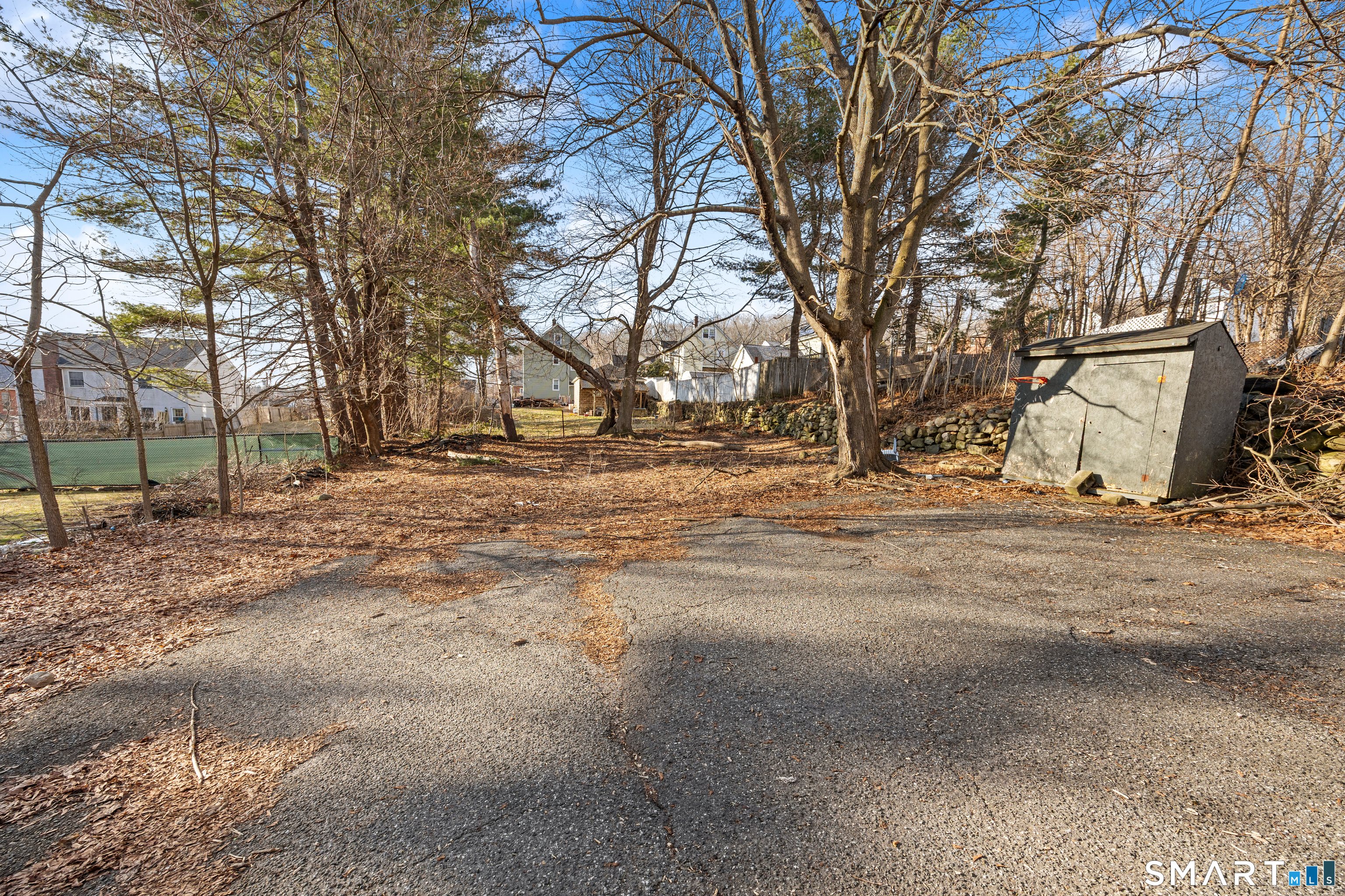 153 Funston Avenue, Unit 1 Torrington, CT 06790 - Photo 16 of 16 a view of empty space with large trees