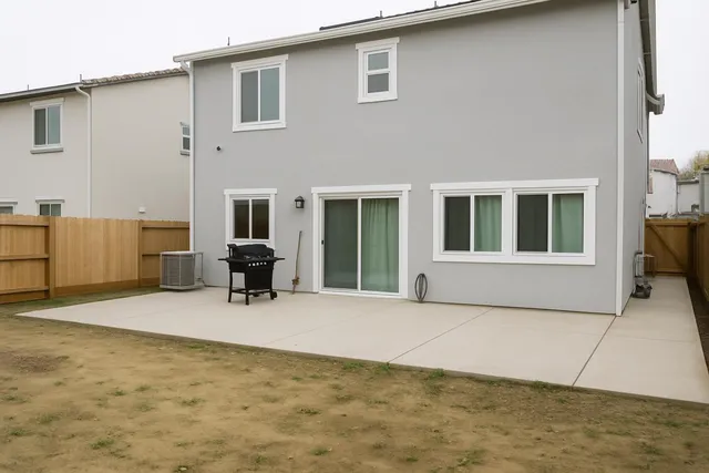 a house view with a outdoor space