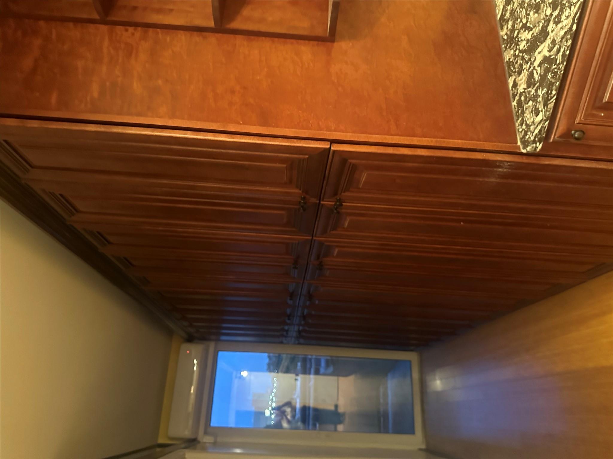 112-02 Northern Boulevard Queens, NY 11368 - Photo 3 of 11 Hallway with a wall unit AC