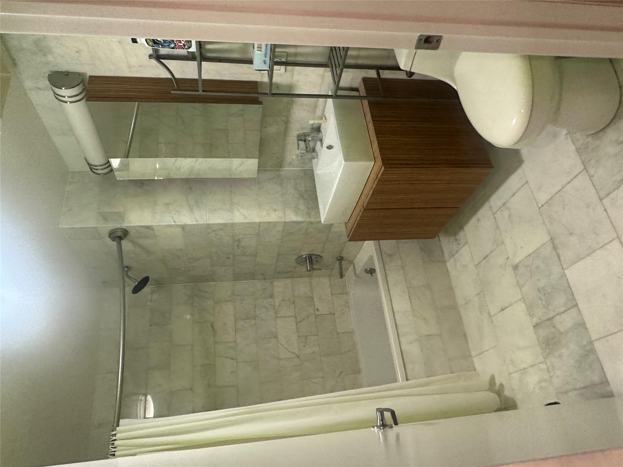 112-02 Northern Boulevard Queens, NY 11368 - Photo 7 of 11 Full bath with tiled shower / bath and vanity