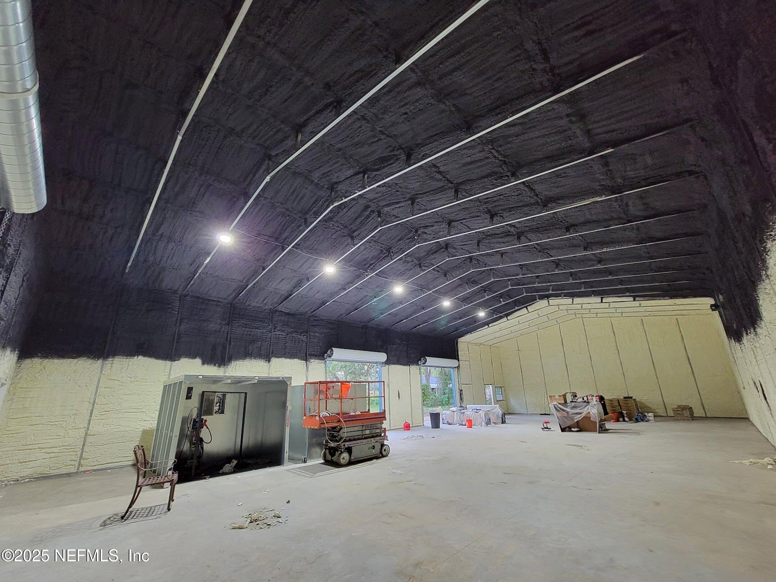 3250 Pacetti Road St. Augustine, FL 32092 - Photo 11 of 31 a view of parking garage with cars