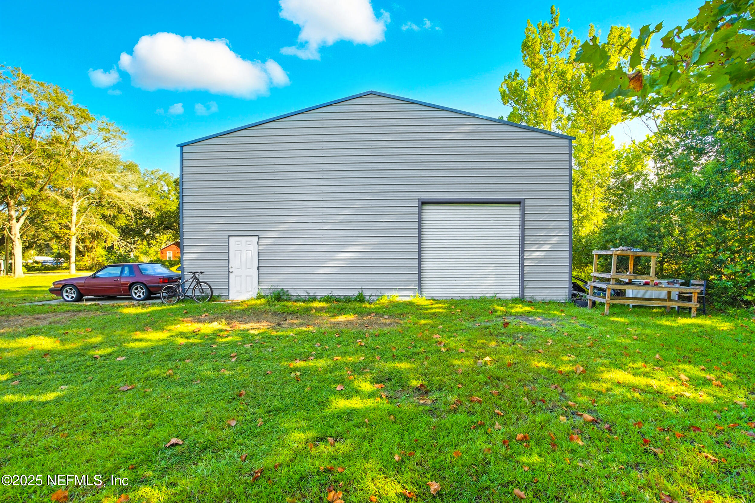 3250 Pacetti Road St. Augustine, FL 32092 - Photo 12 of 31 a front view of a house with a yard
