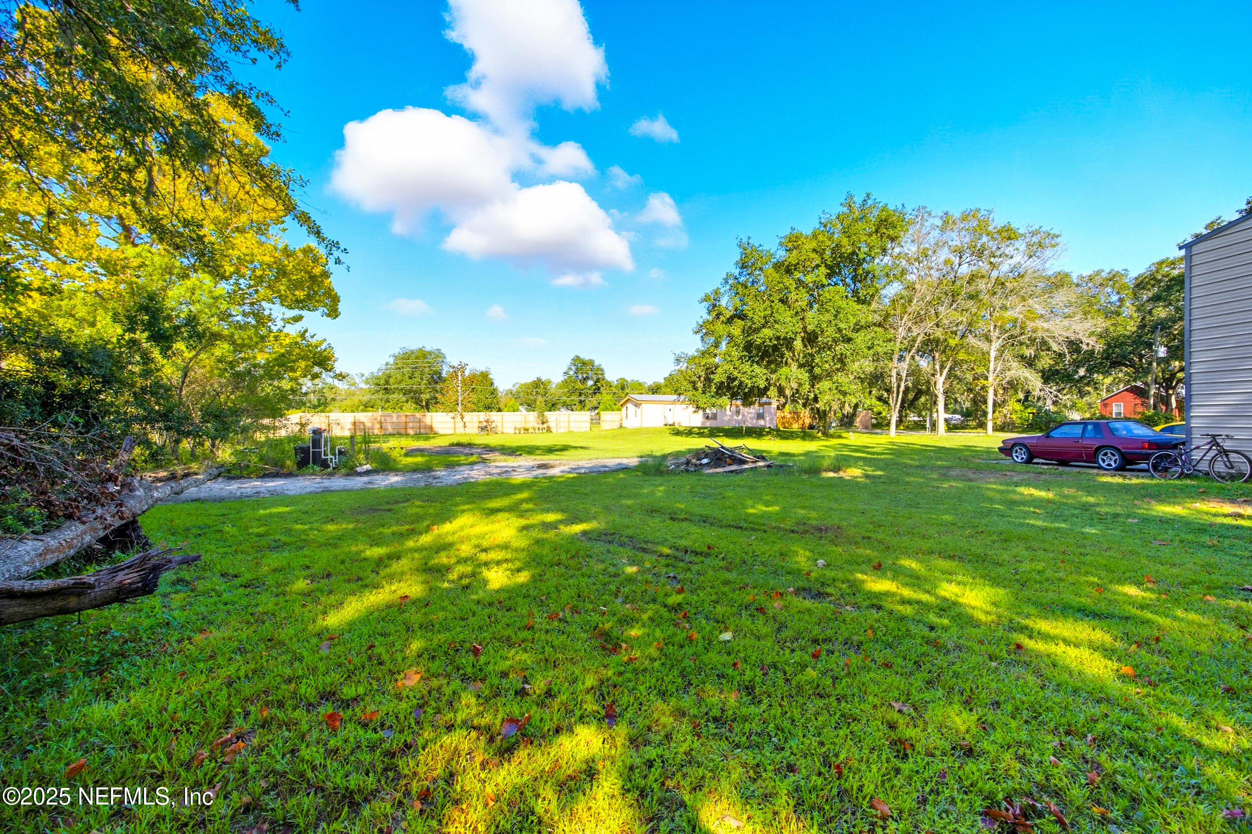 3250 Pacetti Road St. Augustine, FL 32092 - Photo 14 of 31 a view of yard with green space and trees around