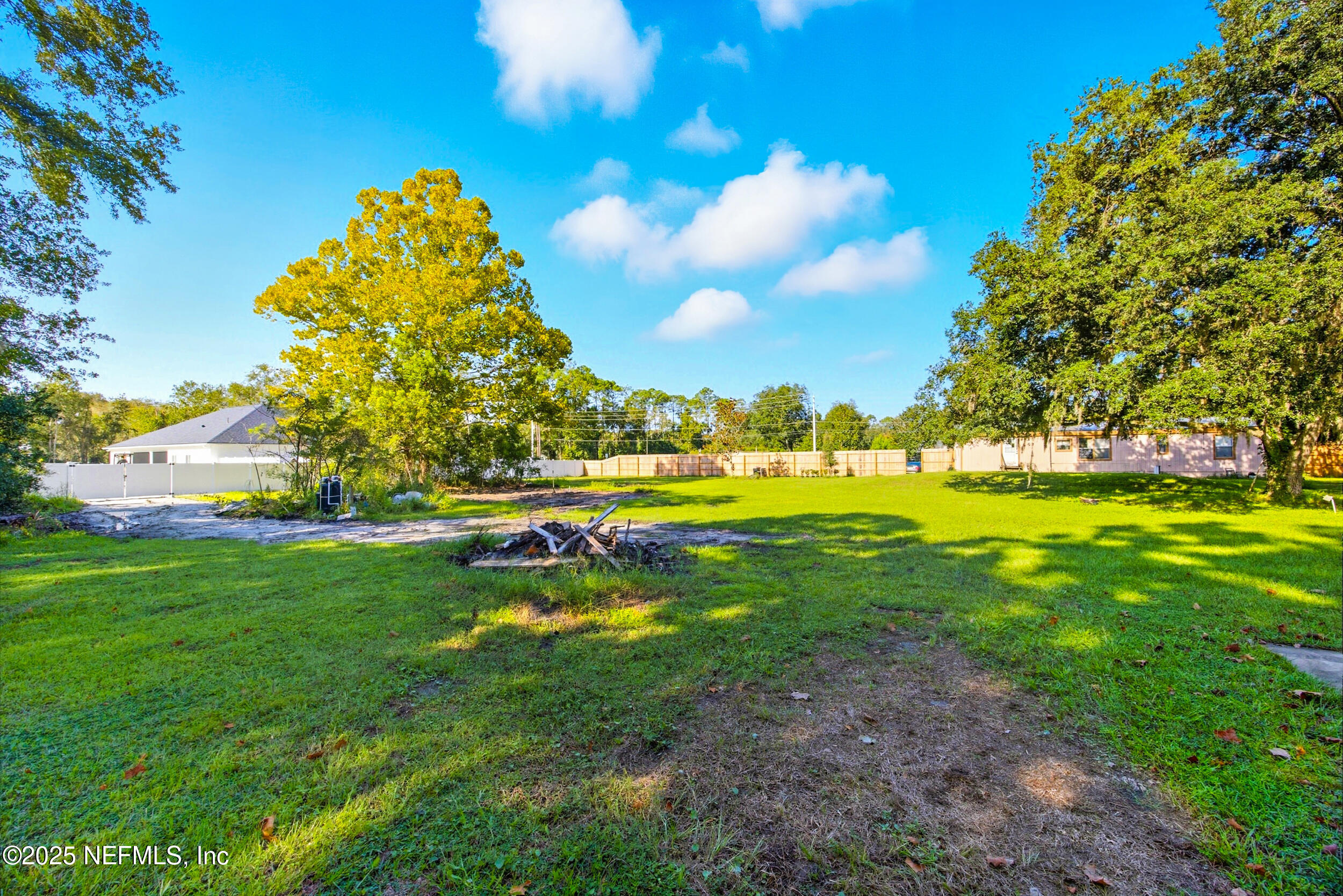 3250 Pacetti Road St. Augustine, FL 32092 - Photo 15 of 31 a view of yard with swimming pool and green space