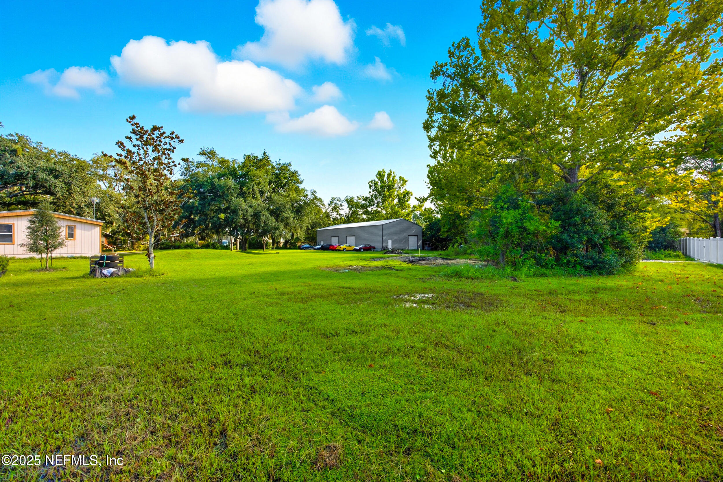 3250 Pacetti Road St. Augustine, FL 32092 - Photo 16 of 31 a view of a house with a big yard