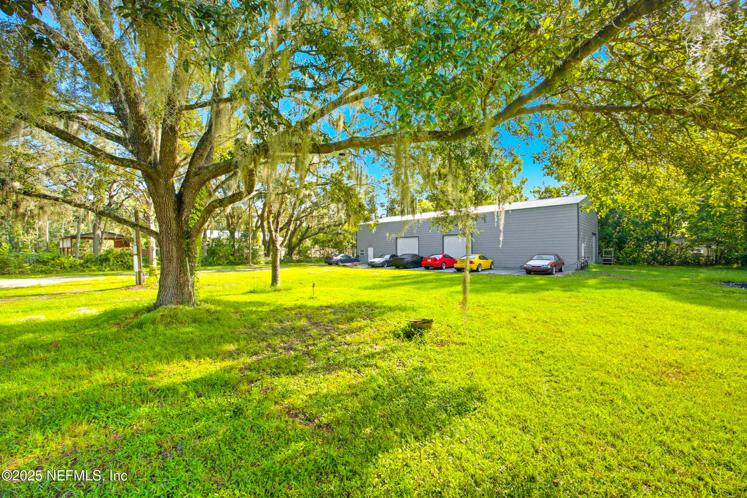 3250 Pacetti Road St. Augustine, FL 32092 - Photo 19 of 31 a view of a house with a yard