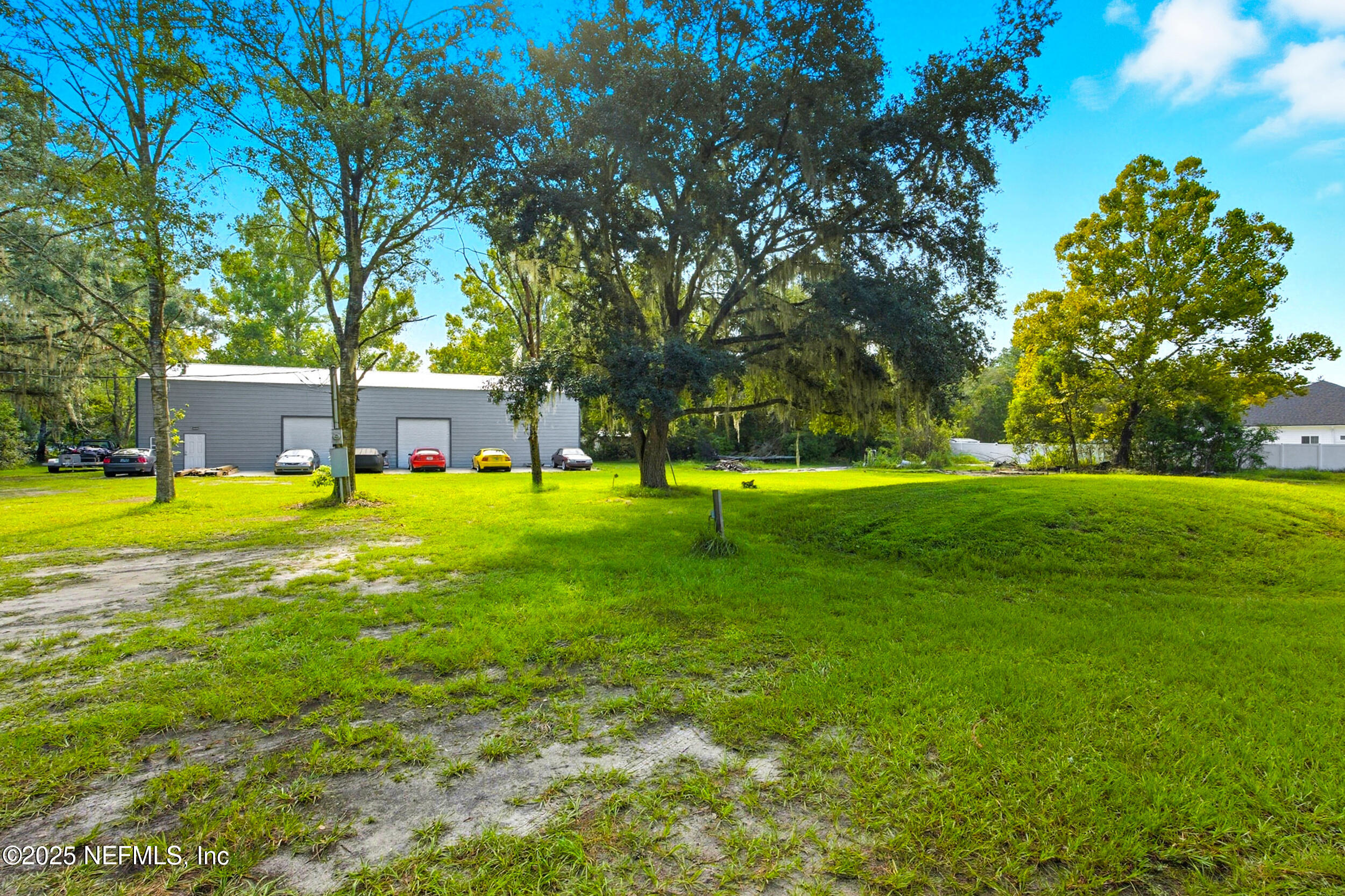 3250 Pacetti Road St. Augustine, FL 32092 - Photo 20 of 31 a view of a house with a big yard
