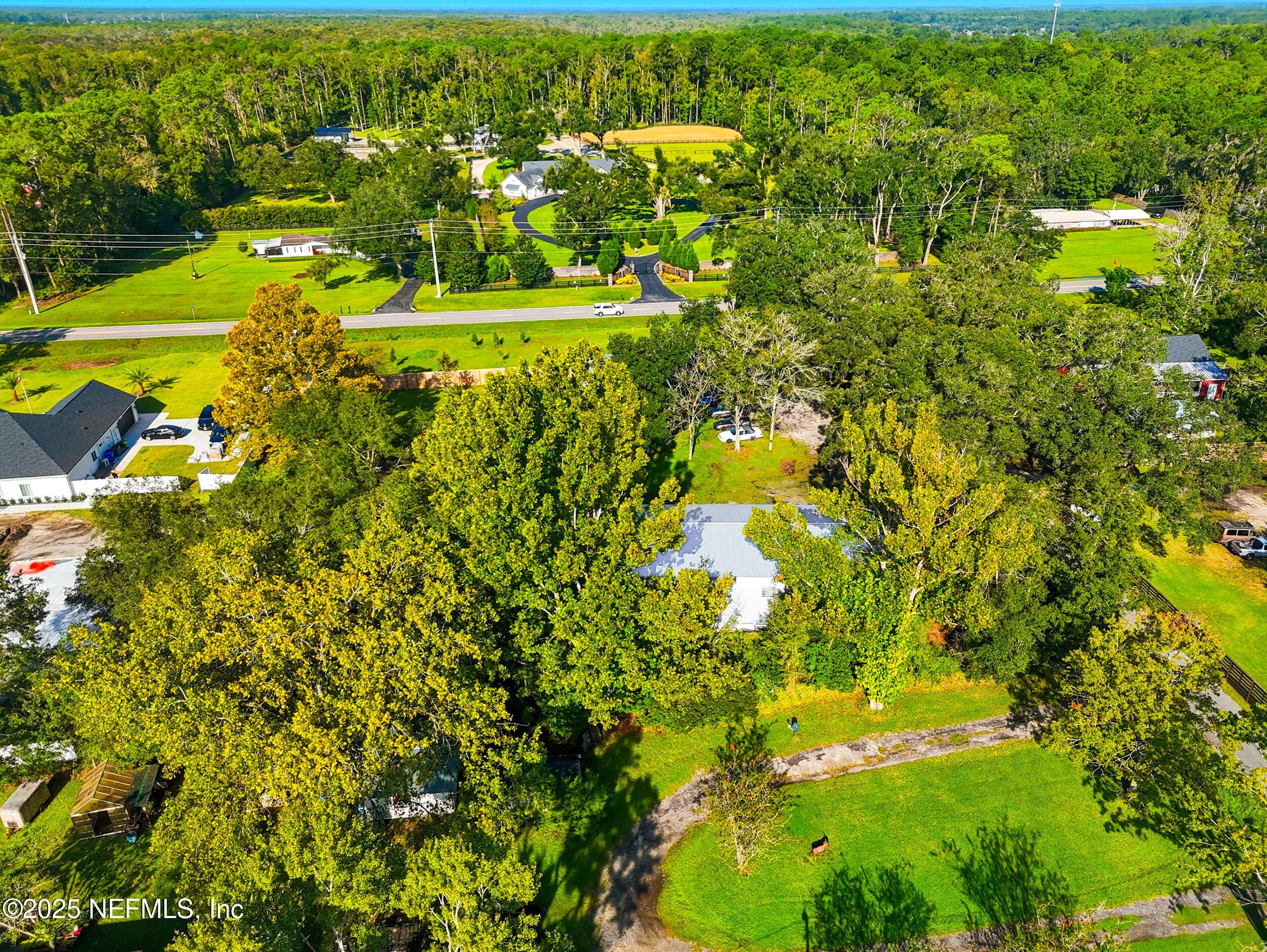 3250 Pacetti Road St. Augustine, FL 32092 - Photo 24 of 31 a view of a lake with a houses
