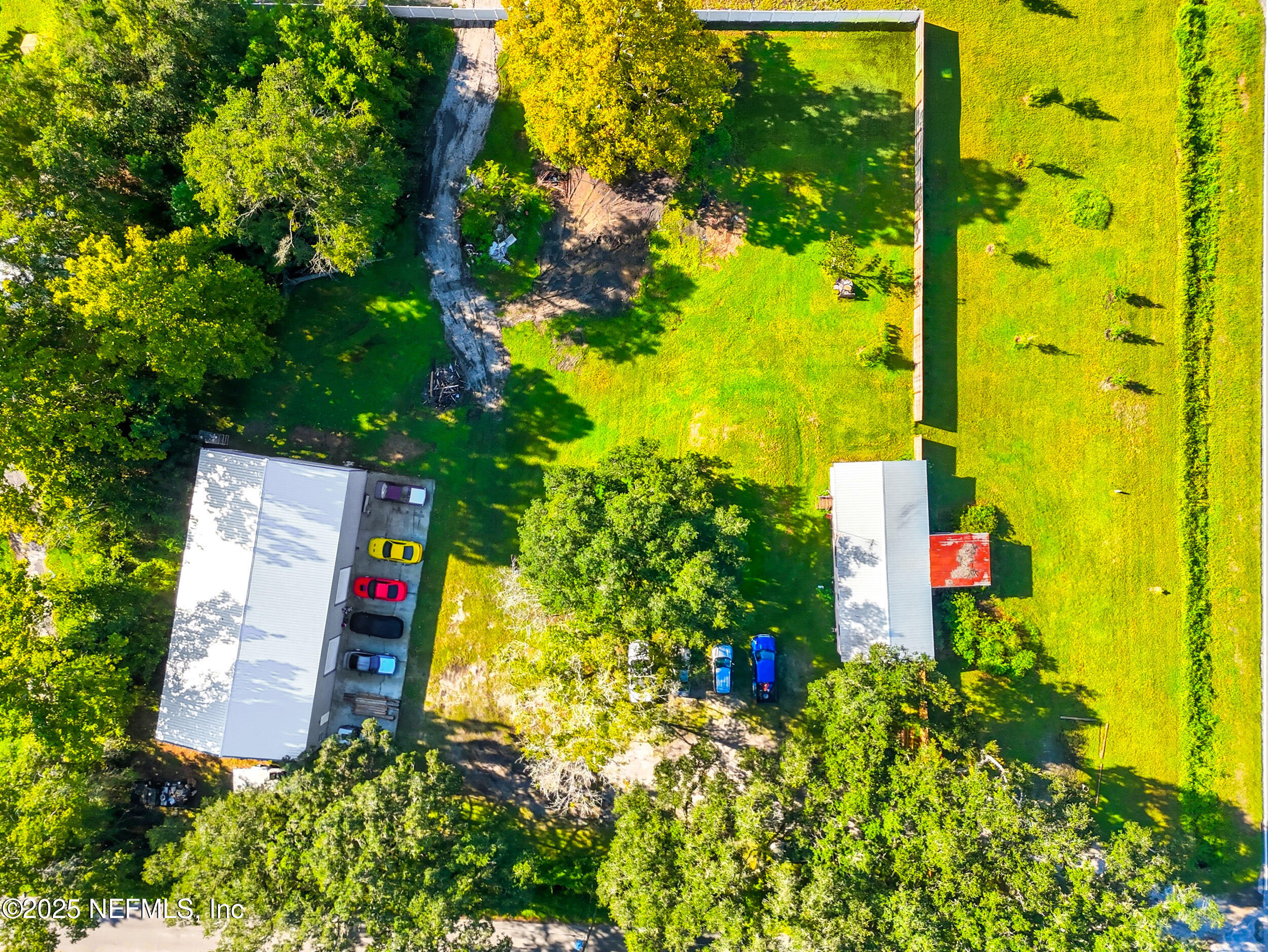 3250 Pacetti Road St. Augustine, FL 32092 - Photo 26 of 31 a sign that is sitting in front of a tree
