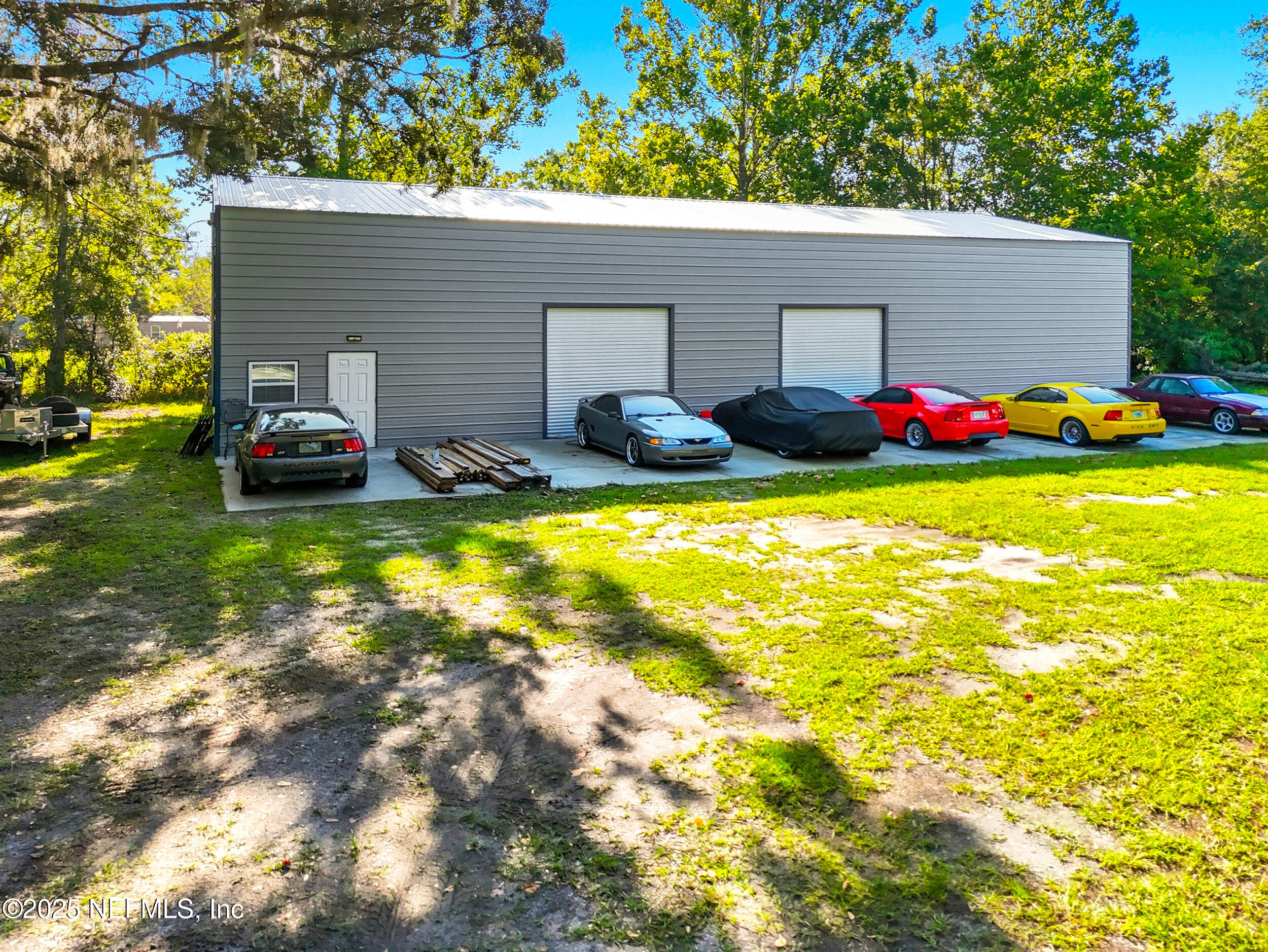 3250 Pacetti Road St. Augustine, FL 32092 - Photo 31 of 31 a view of a house with swimming pool and sitting area