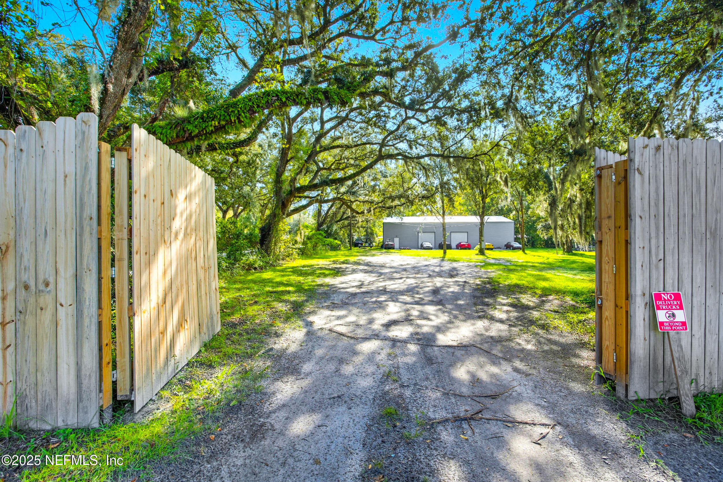 3250 Pacetti Road St. Augustine, FL 32092 - Photo 6 of 31 a view of a back yard with a house
