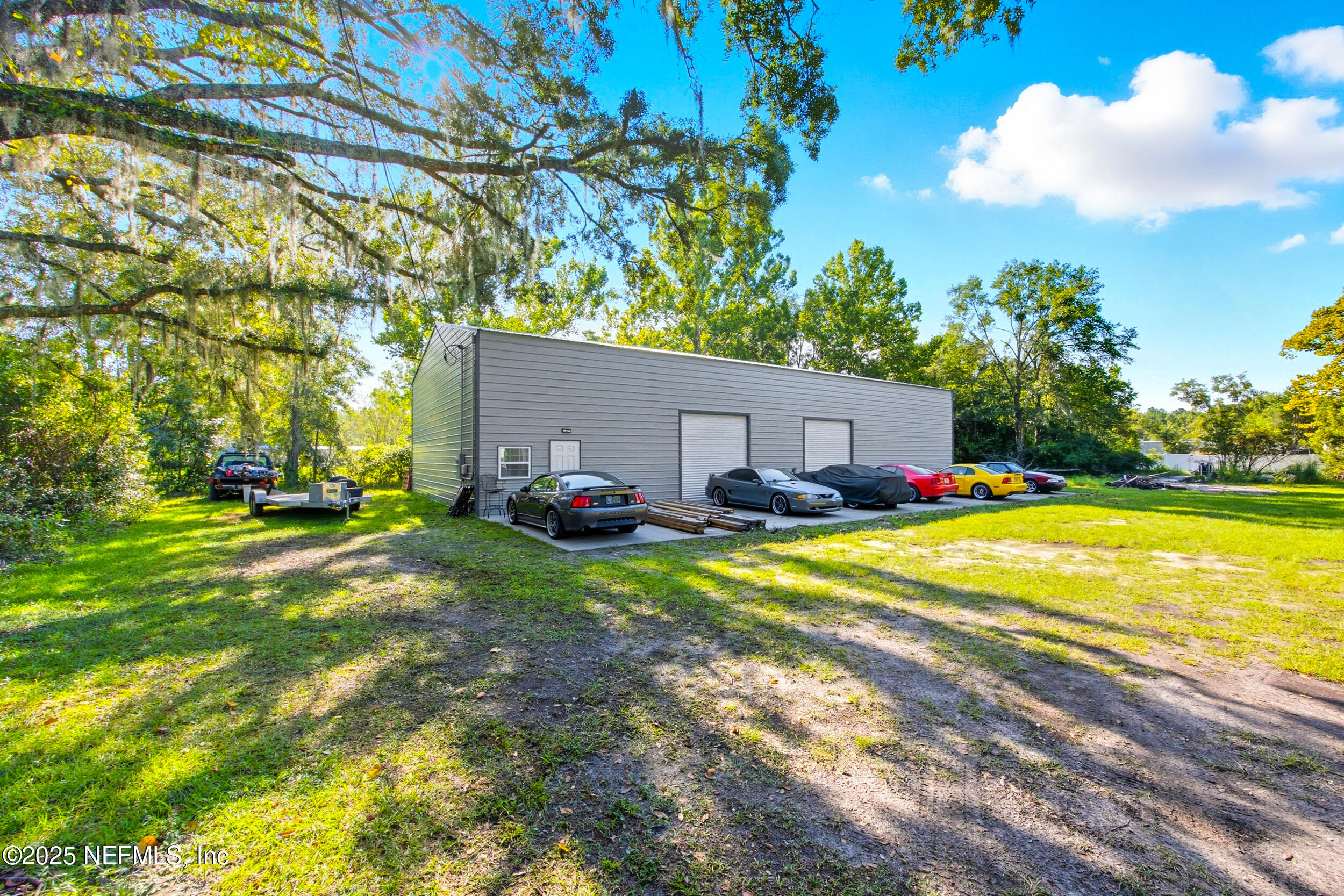 3250 Pacetti Road St. Augustine, FL 32092 - Photo 7 of 31 a view of a house with backyard and sitting area