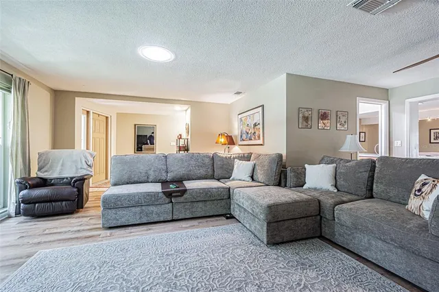 a bathroom with a sink vanity mirror and toilet
