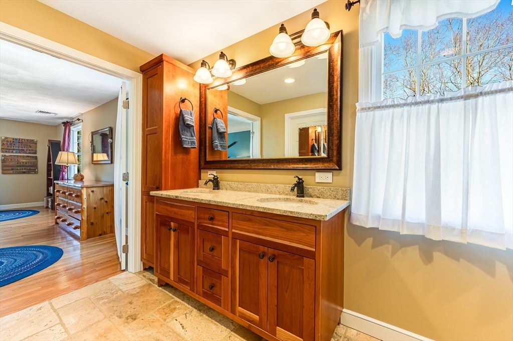 39 Rolling Lane Dover, MA 02030 - Photo 14 of 28 a spacious bathroom with a tub sink and mirror