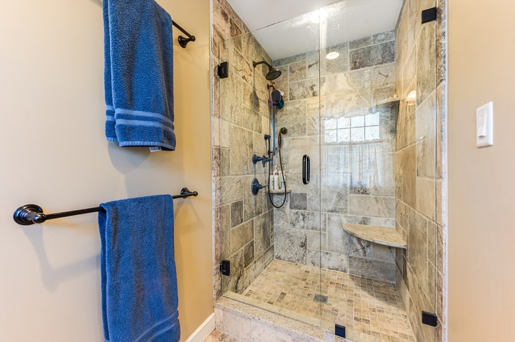 39 Rolling Lane Dover, MA 02030 - Photo 15 of 28 a bathroom with a shower and a sink