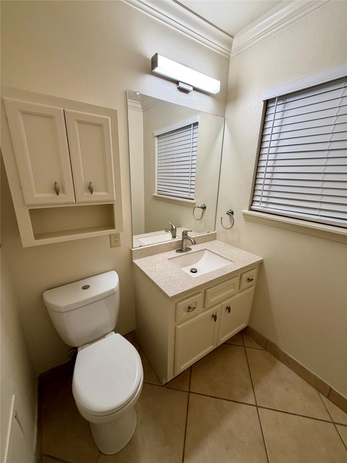 2812 Wichita Street, Unit 6 Houston, TX 77004 - Photo 8 of 15 a bathroom with a sink toilet and mirror