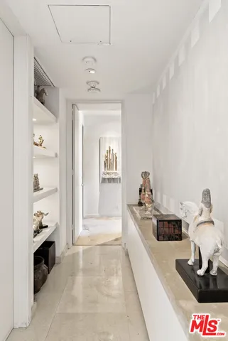 a kitchen with refrigerator and stove