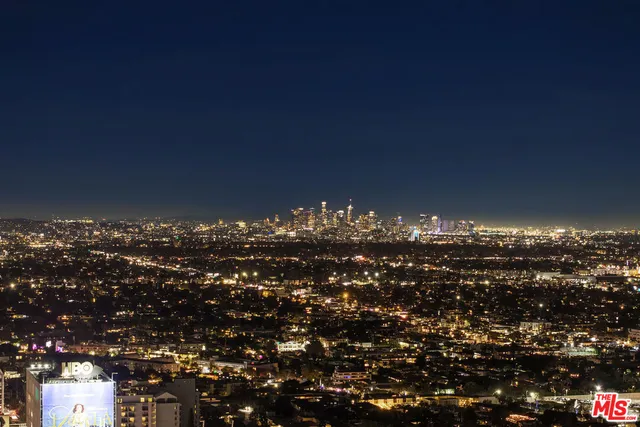 a kitchen with table and chairs