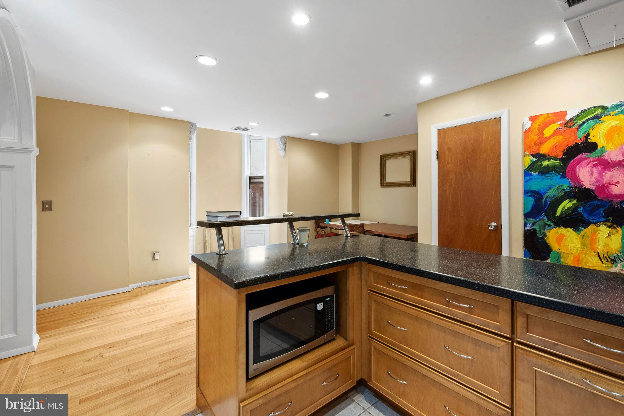 1928 Spring Garden Street, Unit 4 Philadelphia, PA 19130 - Photo 7 of 30 Kitchen facing the dining area & 1/2 bath