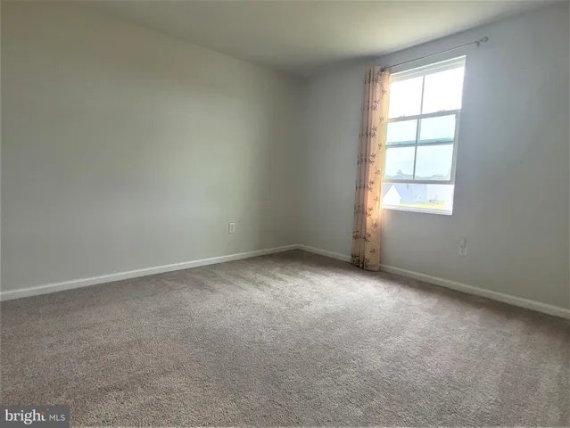 a bathroom with a toilet a sink and a shower