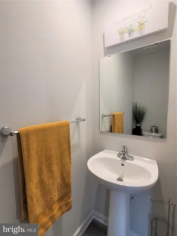 a bedroom with a bed and dresser