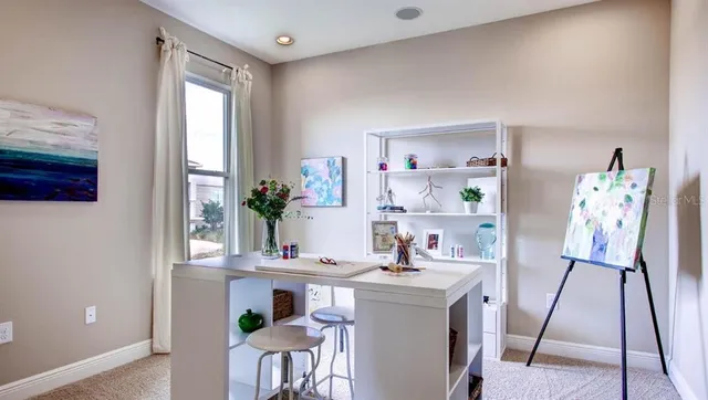 a view of kitchen with furniture and wooden floor