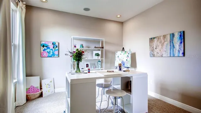 a dining room with a table and chair