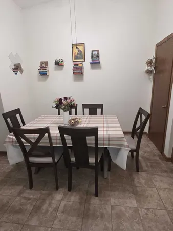 a kitchen with stainless steel appliances a sink and cabinets