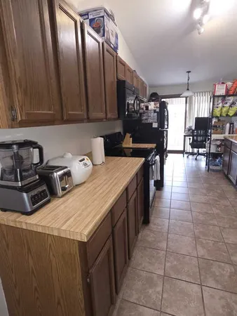 a view of street with parked cars