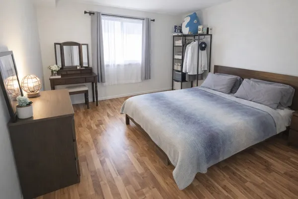 a bathroom with a toilet and a bathtub