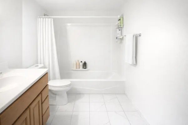 a view of an empty room with a balcony