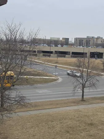 a swimming pool with outdoor seating and yard