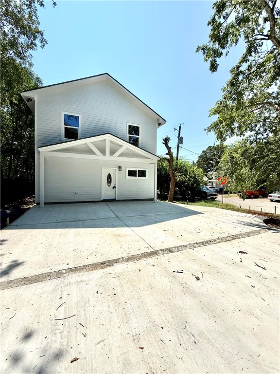 a white house with a outdoor space