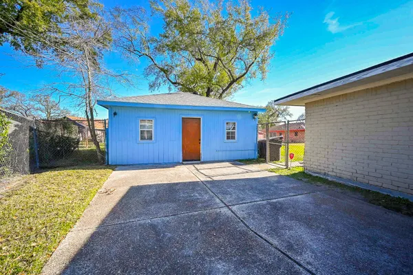 a view of front door of house with entertaining space