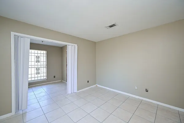 a view of an empty room with window