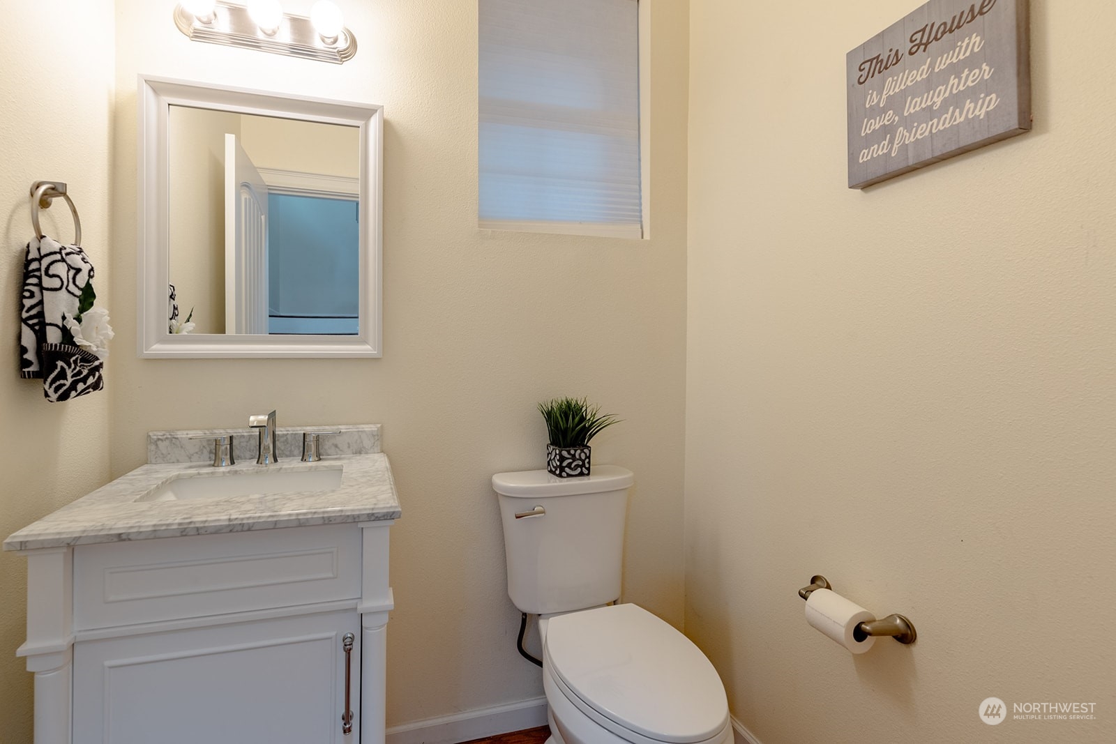 1324 Farina Loop Southeast Olympia, WA 98513 - Photo 13 of 40 a bathroom with a toilet sink and mirror